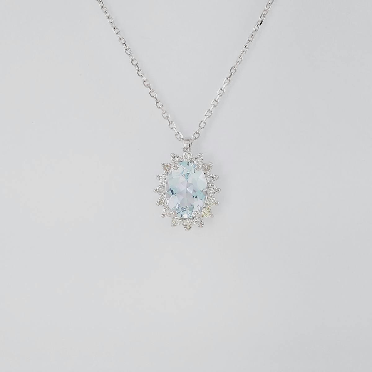 COLGANTE BRILLANTE 0,18 CT Y AGUAMARINA
