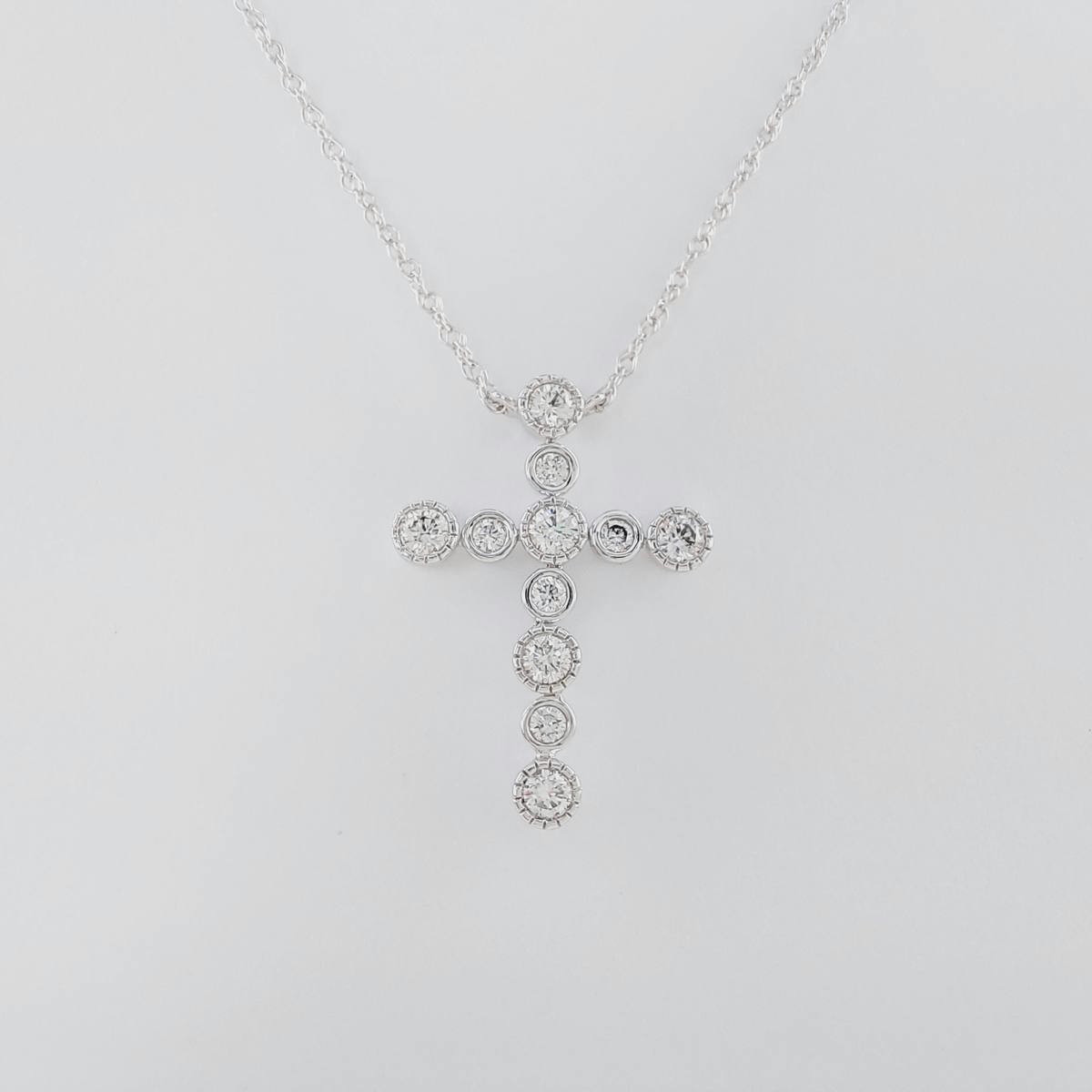 CRUZ BRILLANTES 0,28 CT CON CADENA