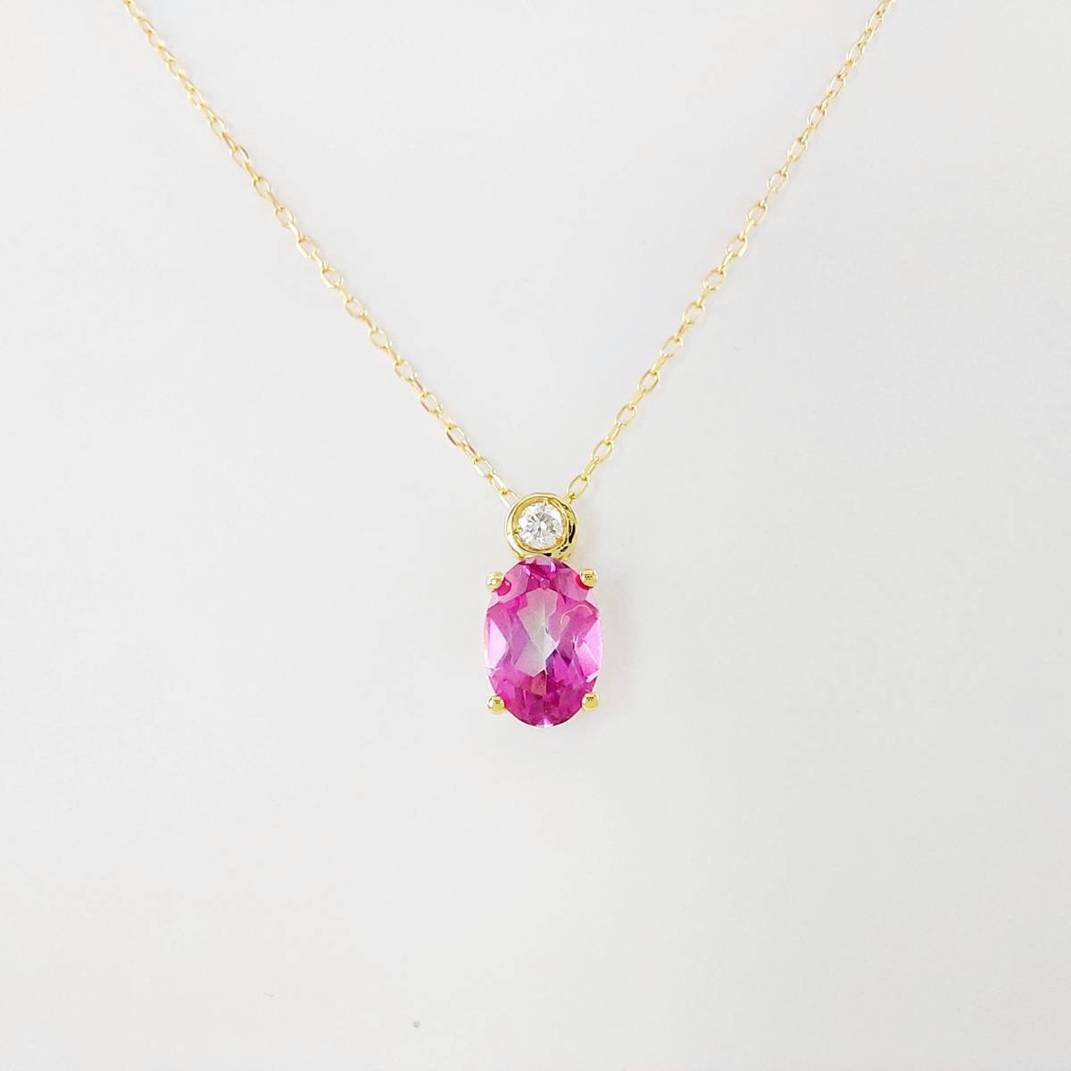 COLGANTE BRILLANTE 0,035 CT Y TOPACIO ROSA