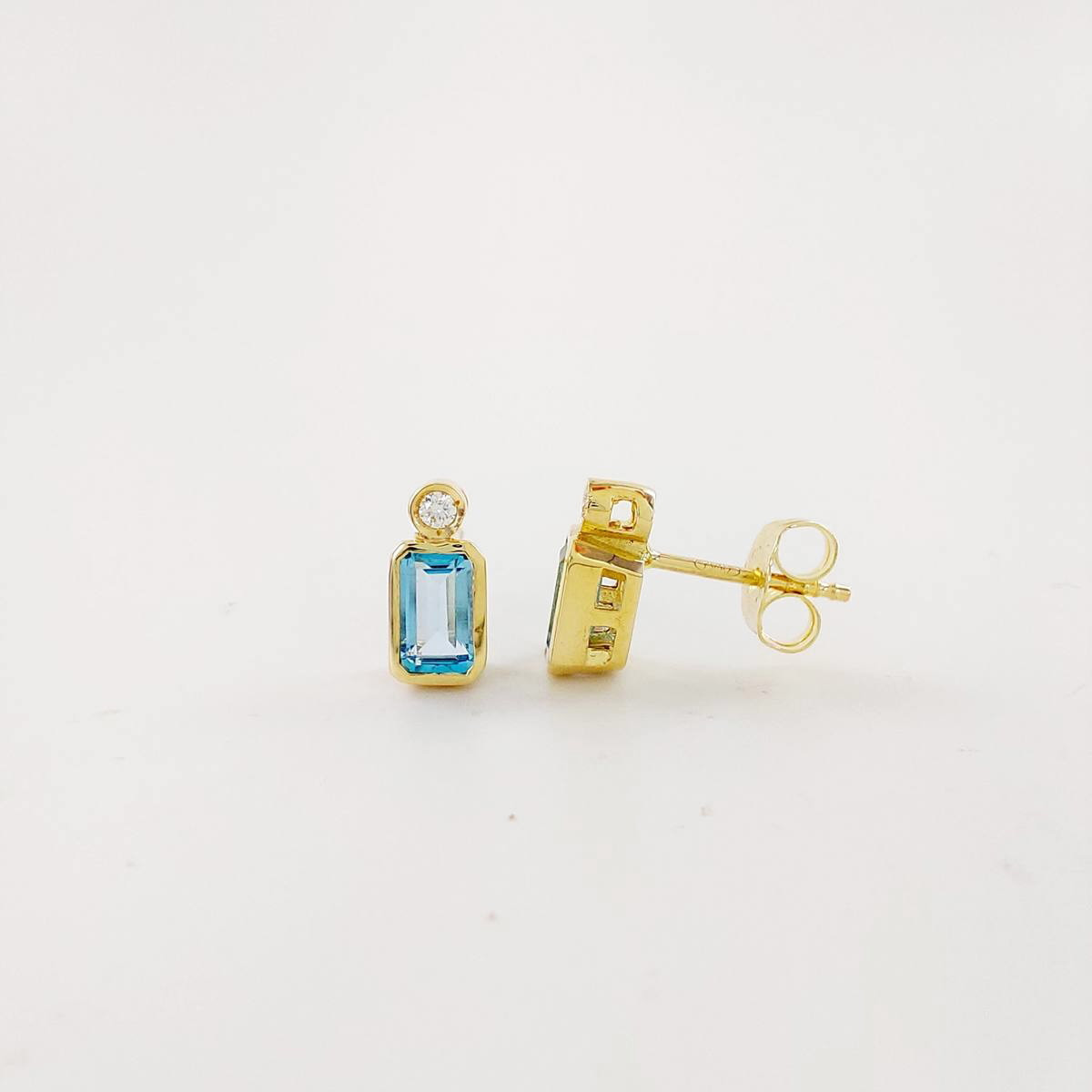 PENDIENTES BRILLANTE 0,03 CT Y TOPACIO AZUL