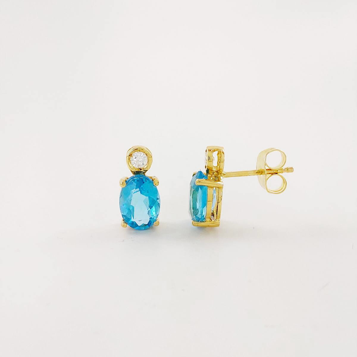 PENDIENTES BRILLANTE 0,07 CT Y TOPACIO AZUL